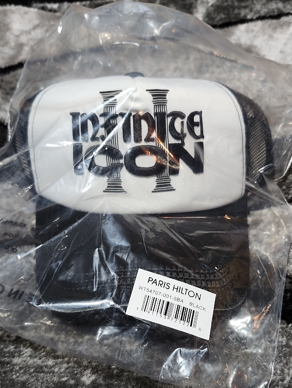 PARIS HITON INFINITE ICON RAISED LIMITED EDITION MESH SNAP-BACK TRUCKER CAP HAT